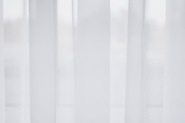  luxury white fabric folded into drapery