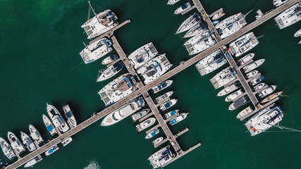 Aerial view of beautiful island at Seychelles in the Indian Ocean. Top view from drone. Spectacular aerial view of some yachts and small boats floating on a clear and turquoise sea, Seychelles in the 
