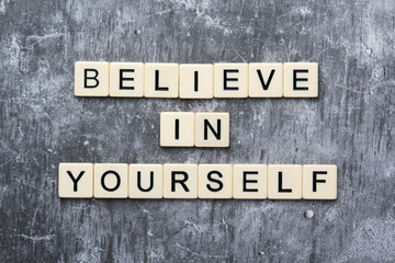 Letters forming a motivation phrase Believe in yourself