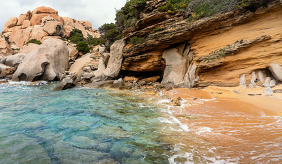 Section of beach between the rocks of Capo Testa in Sardinia, Italy