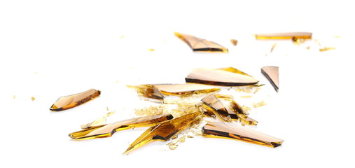 Glass shards, broken beer bottle isolated on white background