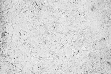 Texture of a concrete wall with cracks and scratches which can be used as a background
