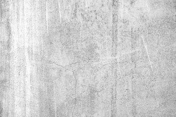 Texture of a concrete wall with cracks and scratches which can be used as a background