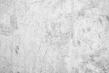 Texture of a concrete wall with cracks and scratches which can be used as a background