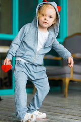 european girl child in tracksuit