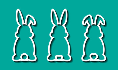Laser cut template. Set of Happy Easter rabbits with ears and tail. For Easter hunt. Vector silhouette of back of fun bunny. Sample illustration isolated on green spring background. Die cut design.