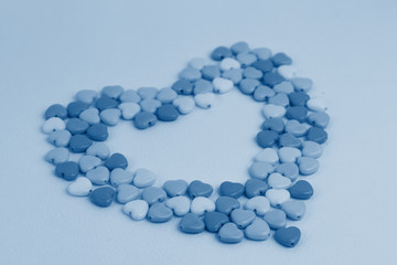 Big heart made up of little hearts. Toned trendy classic blue 2020. Copy space: Valentines and March 8, mother's day concept.
