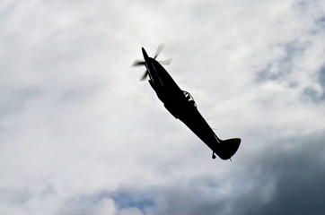 Old propeller fighter silhouette