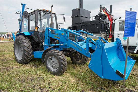 Goryainovka, Mordovia, Russia - June 28, 2019: The excavator on the basis of a tractor Belarus at the public event Russian Plowing Championship.