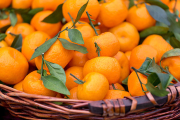 Delicious fresh tangerines in a basket