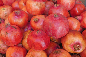 Red Ripe pomegranate fruits in old city market Jerusalem   