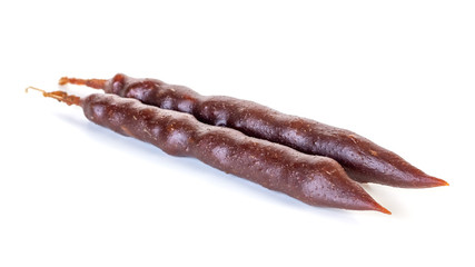 Georgian homemade churchkhela with walnuts and grape juice isolated on white