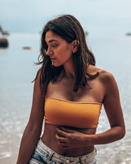 Beautiful girl enjoying a sunny day at the beach