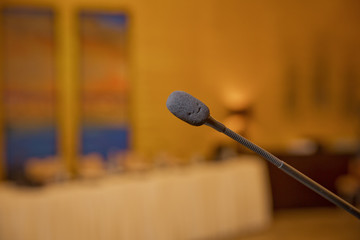 Speech or conference concept. Speaker prepare before speaking to the audience behind the podium...