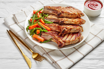 close-up of Grilled pork chops, horizontal view