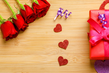 Red rose bunch on wooden board. Valentine day concept  