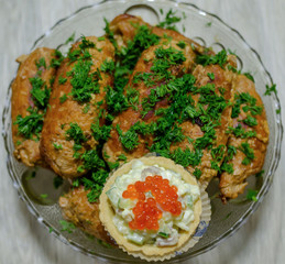 tartlets with salad and red caviar