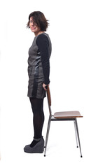 woman with a chair in white background