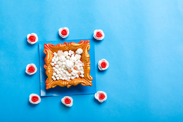 Celebrate Indian festival makar sankranti with colorfull kite,sesame seed ball,tilgul and chakri with background