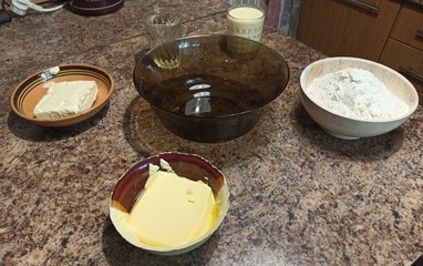 set of ingredients for cake on table