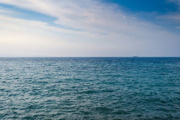 Fototapeta na wymiar Boat are Floating on the Blue Sea and Blue Sky