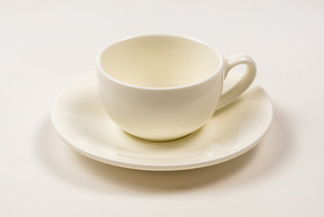 White cup isolated on white background.