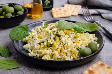 Vegetable salad with olives and spinach