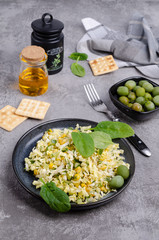 Vegetable salad with olives and spinach