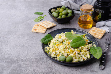 Vegetable salad with olives and spinach