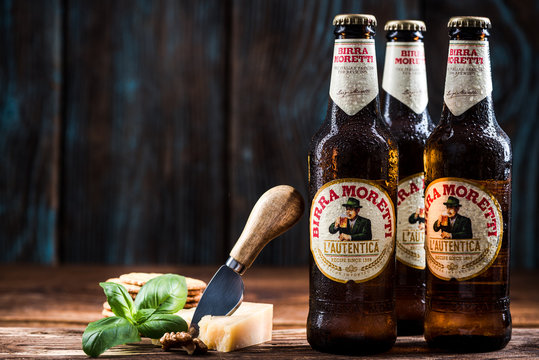 TARNOW, POLAND - SEPTEMBER 24, 2018:  Frozen bottles of Italian beer Birra Moretti, product still life.