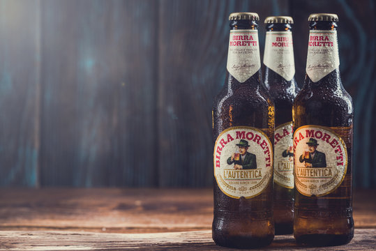 TARNOW, POLAND - SEPTEMBER 24, 2018:  Frozen bottles of Italian beer Birra Moretti, product still life.
