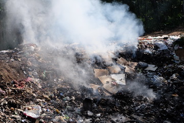 MAEHONGSON PROVINCE, THAILAND-DECEMBER 23 2016, Waste from household in waste landfill. Waste burning in dumping site in THAILAND