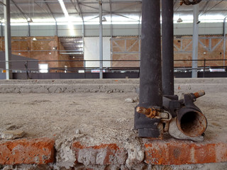 Black pipes as railing in the old factory