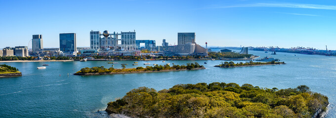 Panoramic view of Tokyo Bay with green islands  in Odaiba city skyline, Japan