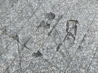 Road surface with cracks in holes - Texture background - Thai walkways