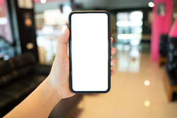 Women's hands holding cell telephone watching social media in a smart phone. social network concept with smart phone