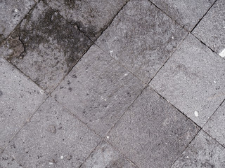 Fototapeta premium Rectangle-shaped gray natural stones as wall finishing material