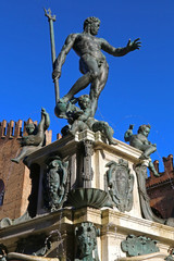 Fototapeta na wymiar Bologna - Italy, December 2019, touristic city landscape, Nettuno fountain and monument, Piazza Maggiore