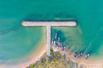 Aerial view of fishing boats in the harbor in beautiful natural islands