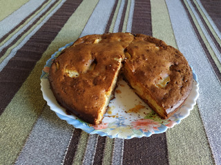 homemade apple pie. homemade pie on a striped tablecloth