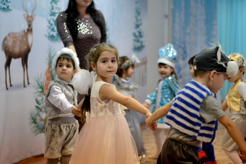 Pupils of the middle group at the new year's holiday in kindergarden 