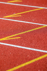 Fototapeta premium Red running sport track background and texture. Sport running track concept.