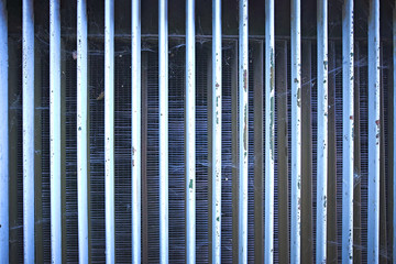 Radiator grille from the air conditioner texture. Close up car air conditioning condenser unit texture.