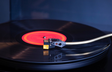 Vintage Stereo Turntable Plays Red Vinyl Record Album, Tonearm with Headshell