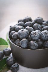 blueberries on wood white background
