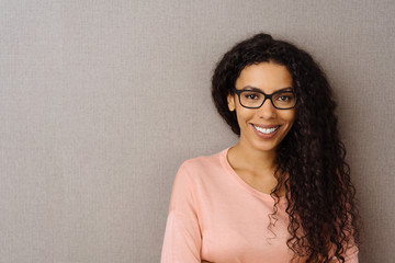 Happy friendly young woman with vivacious smile