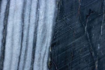 Raw black nature marble patterned texture background