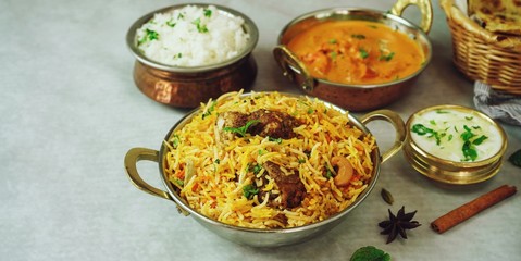 Indian meal / Restaurant menu concept - Mutton biryani, butter chicken, Roti