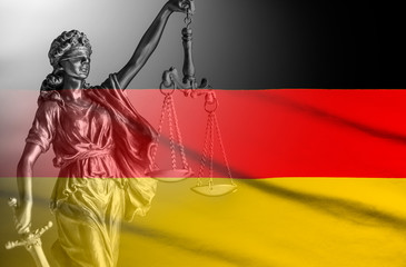 Flag of Germany with a statue of Justice