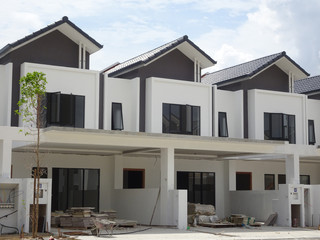 Double story luxury terrace house under construction in Malaysia.  Designed by an architect with a modern and contemporary style. 